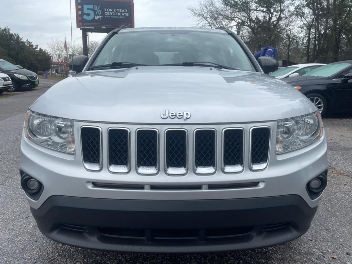 2012 SILVER JEEP COMPASS SPORT (1C4NJCBA8CD) with an 2.0L engine, Continuously Variable transmission, located at 5103 Dorchester Rd., Charleston, SC, 29418-5607, (843) 767-1122, 36.245171, -115.228050 - Spacious Interior with CD/AUX/AM/FM, Hands-free Phone, Power Windows, Power Locks, Power Windows, Power Mirrors, Keyless Entry, Alloy Wheels. Local Trade-in!! 108k miles Located at New Life Auto Sales! 2023 WINNER for Post & Courier's Charleston's Choice Pre-owned Car Dealer AND 2018-2024 Top 5 Fin - Photo#1